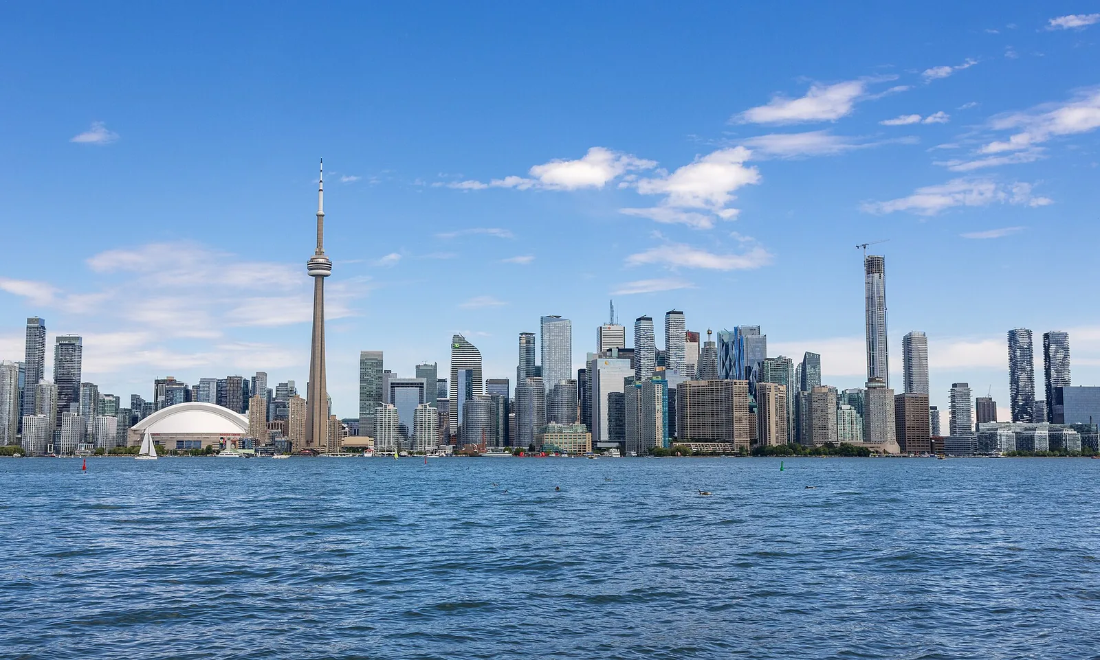 Toronto skyline and CN Tower across the water from Olympic Island