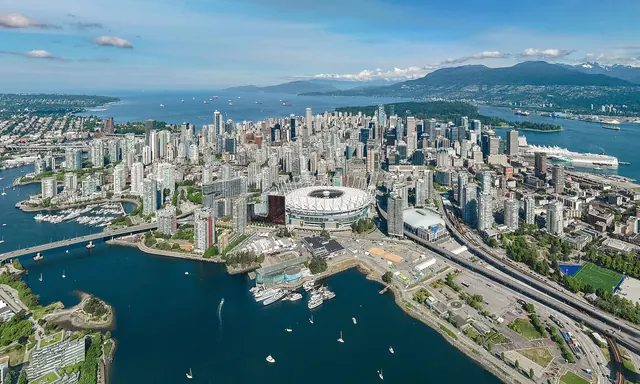 Downtown Vancouver skyline with mountains beyond